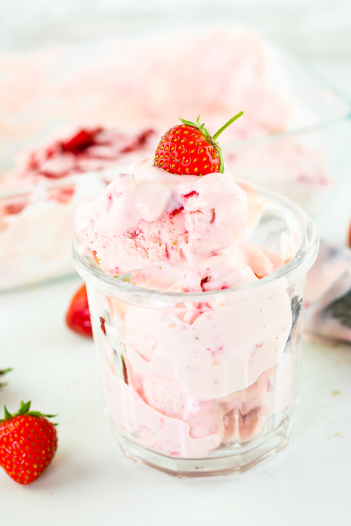 Strawberry cottage cheese ice cream with blended strawberries throughout.