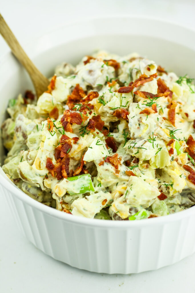 A bowl of loaded cottage cheese potato salad