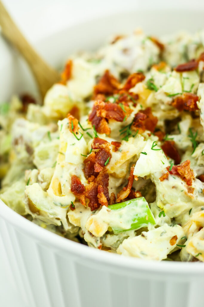 A bowl of loaded cottage cheese potato salad