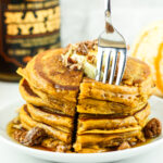 Stack of fluffy pumpkin cottage cheese pancakes.